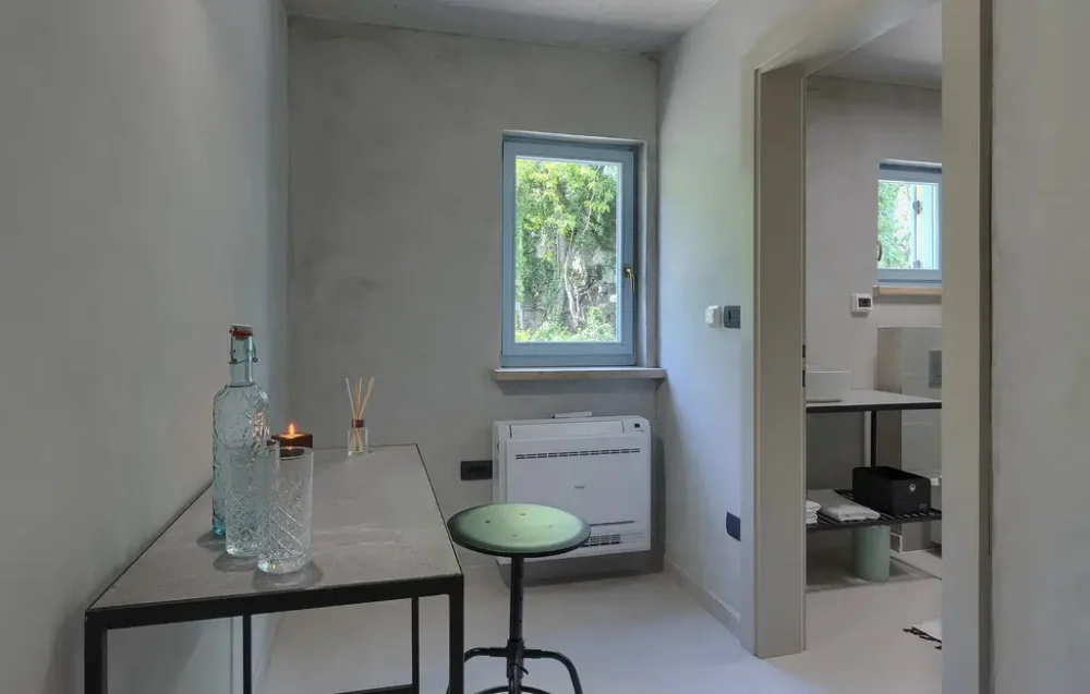 Minimalist room with table and window view