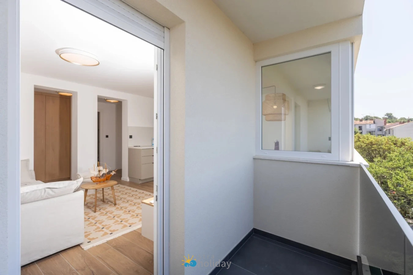 Small balcony overlooking modern living room interior