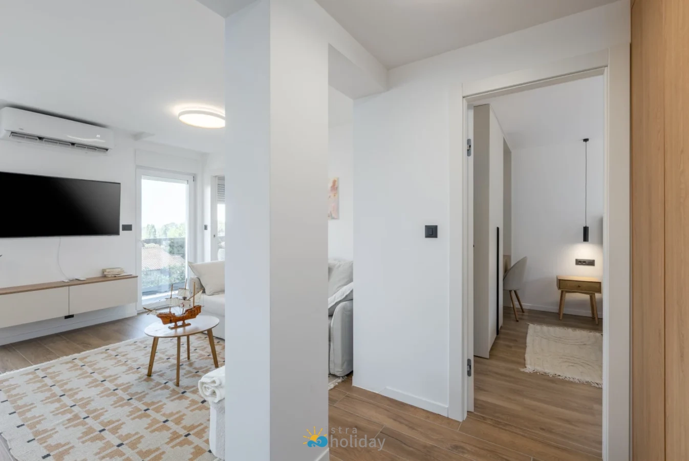 Modern minimalist living room and hallway interior