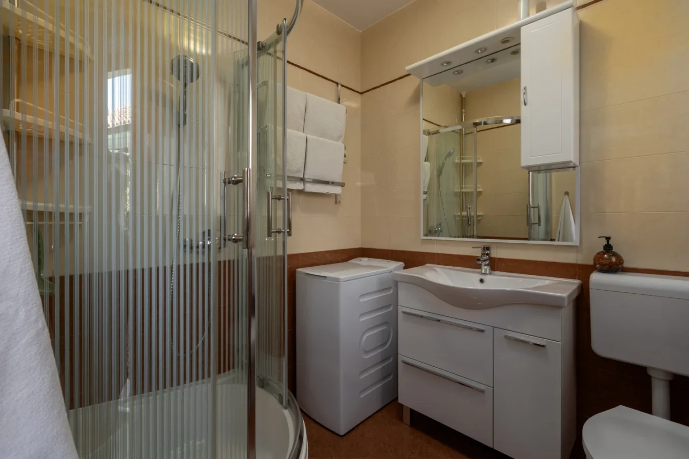 Modern bathroom with glass shower and vanity
