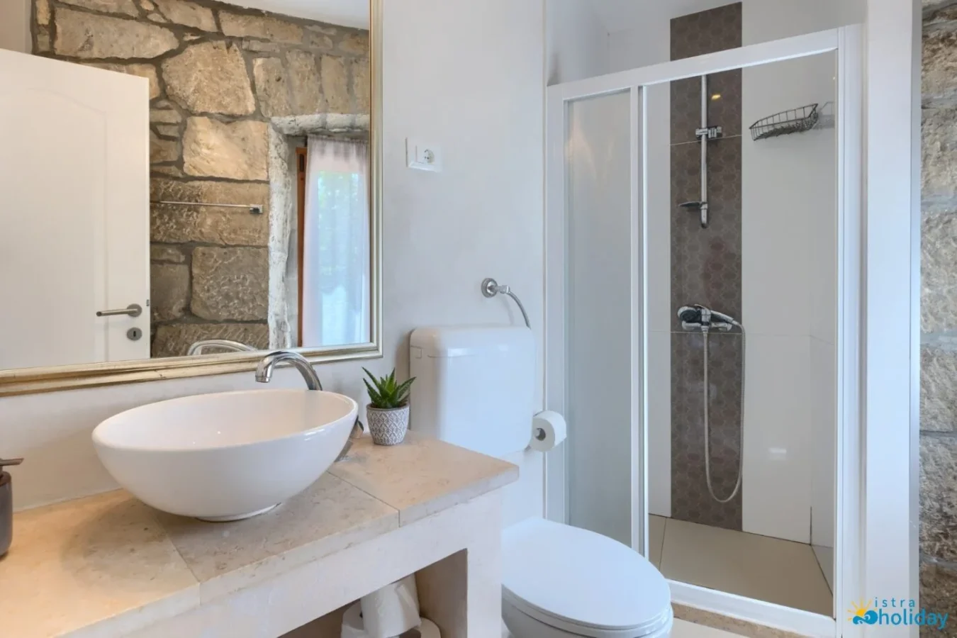 Modern bathroom with stone walls and shower