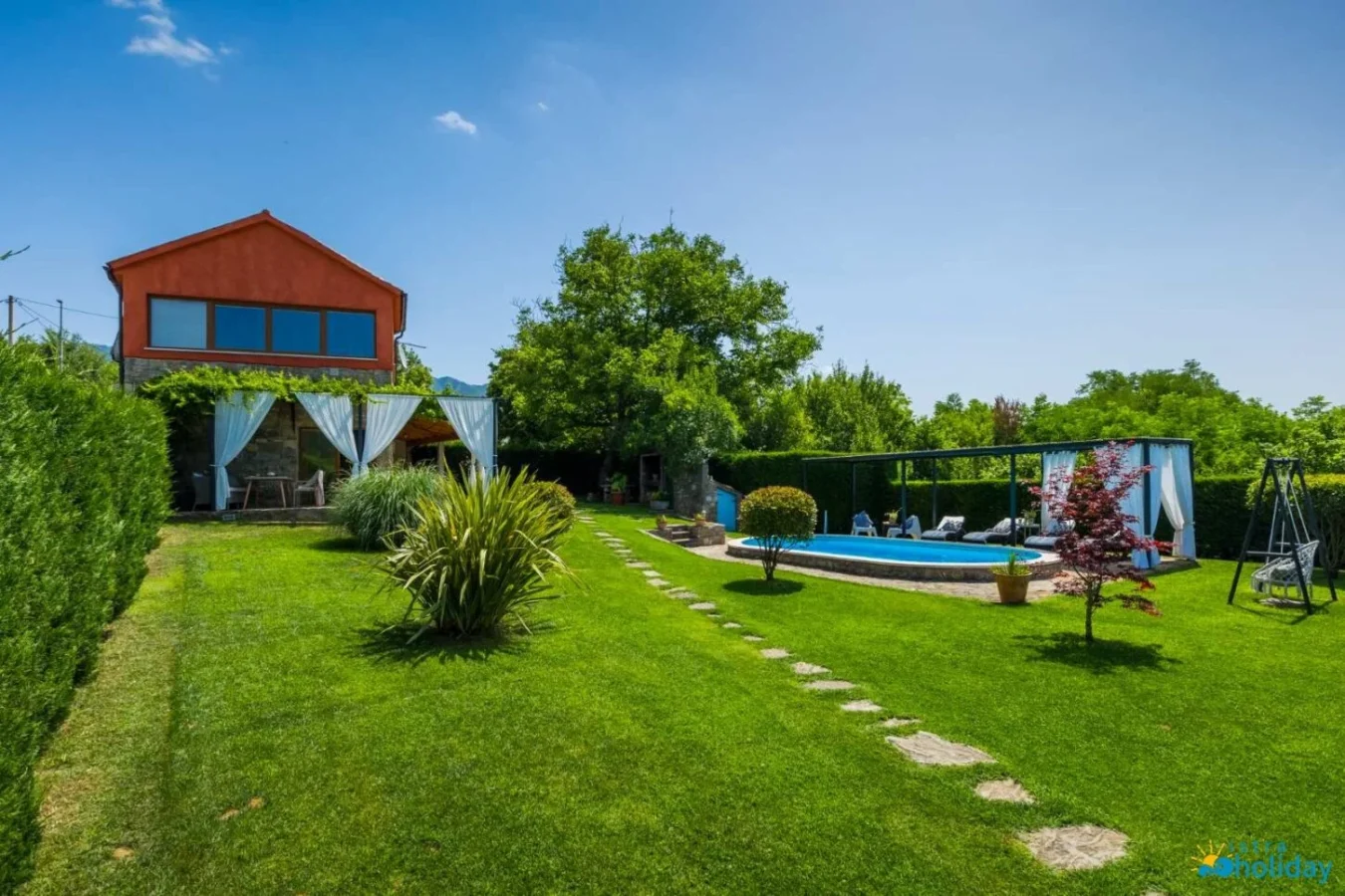 Beautiful backyard with pool and garden